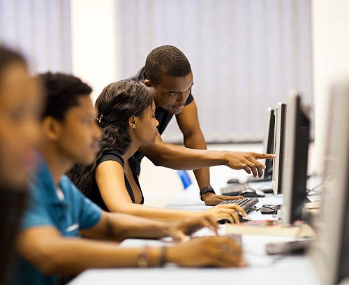 african american college students in computer room